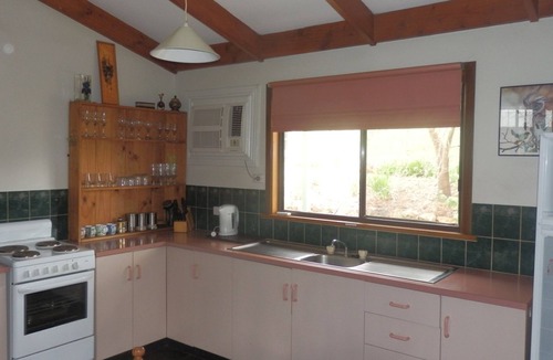 Spring Gully House | mount charmal cottage. 5 person spa under pergola. Large combination heater.