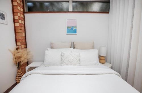 Forster House | One Mile Studio - 70s style ocean escape