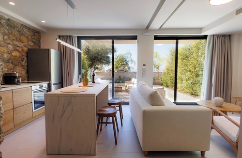 Paralia Vergas Villa | Potis Lower Suite - 2-bedroom suite with private patio