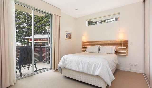 Breeze Beachfront Apartment 1: Ocean Views and Convenient Ground Floor Access!