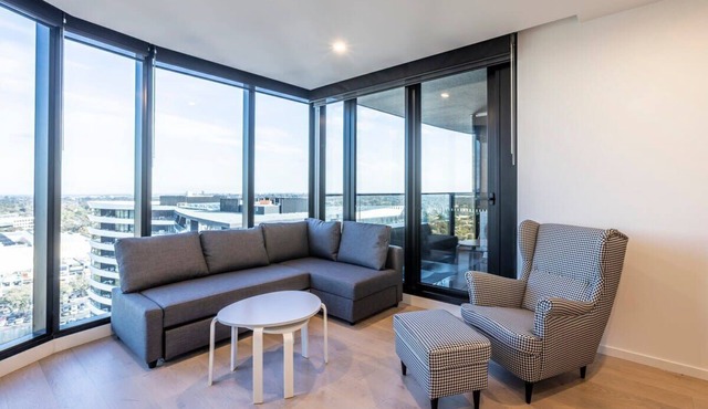 Modern 2BR Abode with Balcony View & Gym Access